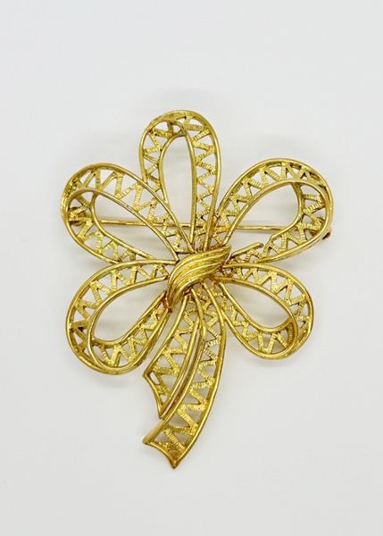 (us)gold tone bow brooch